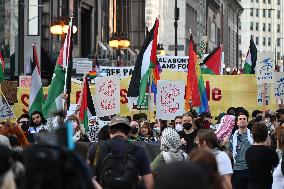 Protesters Demonstrate On The March Of The Eve Of The Democratic National Convention In Chicago Illinois