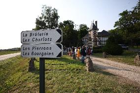 Fans Gather At Alain Delon's Residence In Douchy Where He Died On Sunday