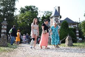 Fans Gather At Alain Delon's Residence In Douchy Where He Died On Sunday