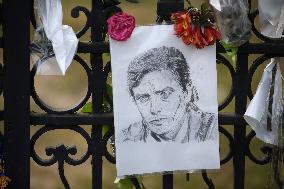 Fans Gather At Alain Delon's Residence In Douchy Where He Died On Sunday