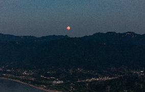 A Supermoon Appears over The Three Gorges Dam in Yichang