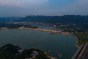 A Supermoon Appears over The Three Gorges Dam in Yichang