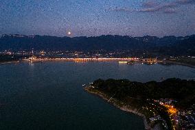 A Supermoon Appears over The Three Gorges Dam in Yichang