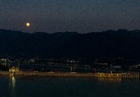 A Supermoon Appears over The Three Gorges Dam in Yichang