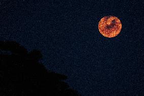 Supermoon Lights Up The Sky Above Lloret De Mar - Spain