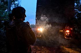 Ukrainian artillerymen fire multiple rocket launcher in Donetsk region