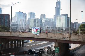 Pro-Gaza Banner Drop Over Morning Traffic In Chicago