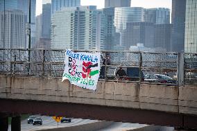 Pro-Gaza Banner Drop Over Morning Traffic In Chicago