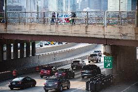 Pro-Gaza Banner Drop Over Morning Traffic In Chicago