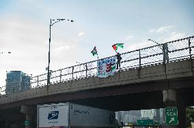 Pro-Gaza Banner Drop Over Morning Traffic In Chicago