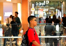 Tourists Visit Wangfujing Pedestrian Street in Beijing