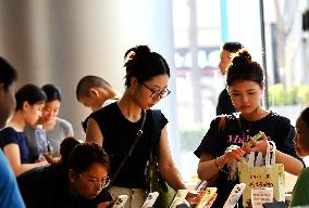 Tourists Visit Wangfujing Pedestrian Street in Beijing