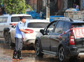 Disastrous Rainstorms Drench Provinces Across China