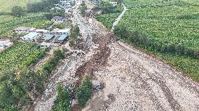 China Anneng Shenyang Rescue Team Repairs A Road in Huludao