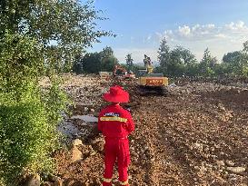 China Anneng Shenyang Rescue Team Repairs A Road in Huludao