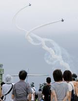 Blue Impulse aerobatic team flies over ASDF base in northeastern Japan