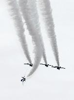 Blue Impulse aerobatic team flies over ASDF base in northeastern Japan