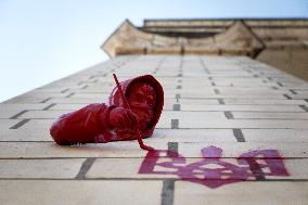 Sculpture by French street artist James Colomina on Central Post Offices wall in Kyiv