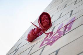 Sculpture by French street artist James Colomina on Central Post Offices wall in Kyiv