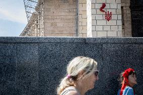 Sculpture by French street artist James Colomina on Central Post Offices wall in Kyiv