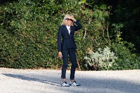 Brigitte Macron walks dogs in the Elysee Garden - Paris