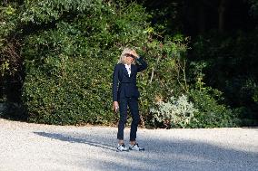 Brigitte Macron walks dogs in the Elysee Garden - Paris