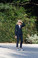 Brigitte Macron walks dogs in the Elysee Garden - Paris