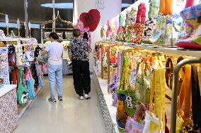 Tourists Shop For Central Asian Products