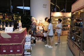 Tourists Shop For Central Asian Products