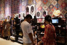 Tourists Shop For Central Asian Products