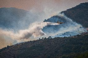 Wildfire Threatens Homes - Split