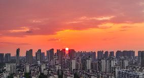 Urban Buildings Illuminated By The Setting Sun in Huai'an