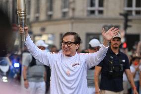 Paris 2024 Paralympics - Jackie Chan Carries The Flame - Paris