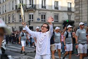 Paris 2024 Paralympics - Jackie Chan Carries The Flame - Paris