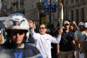 Paris 2024 Paralympics - Jackie Chan Carries The Flame - Paris