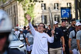 Paris 2024 Paralympics - Jackie Chan Carries The Flame - Paris