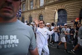 Paris 2024 Paralympics - Jackie Chan Carries The Flame - Paris