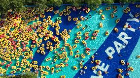 Tourists Cool Off on Rubber Boats at A Water Park in Shenyang