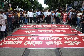 Citizens Are Participating In A Protest March In Kolkata, India