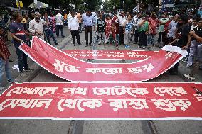 Citizens Are Participating In A Protest March In Kolkata, India