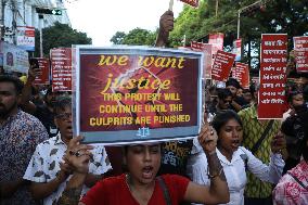 Citizens Are Participating In A Protest March In Kolkata, India