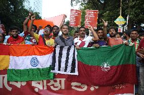 Citizens Are Participating In A Protest March In Kolkata, India