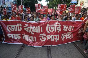 Citizens Are Participating In A Protest March In Kolkata, India