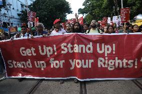 Citizens Are Participating In A Protest March In Kolkata, India