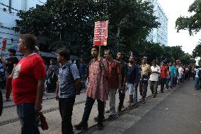 Citizens Are Participating In A Protest March In Kolkata, India