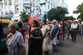 Citizens Are Participating In A Protest March In Kolkata, India