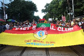 Citizens Are Participating In A Protest March In Kolkata, India