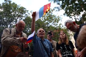 Protesters Burn The Russian Flag