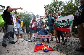 Protesters Burn The Russian Flag