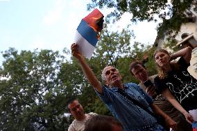 Protesters Burn The Russian Flag